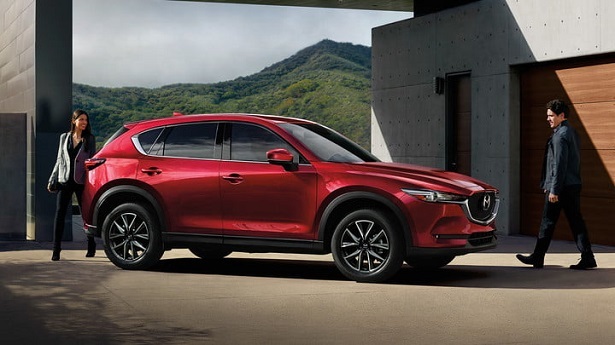 2018 Mazda CX-5 red with couple
