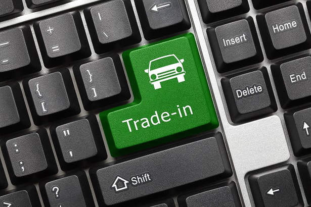 green trade-in key on computer keyboard