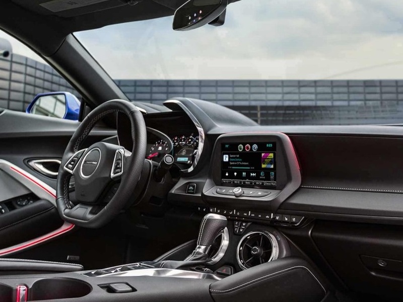 You get used to Camaro's interior, but you'll never love it. (image: Chevy)